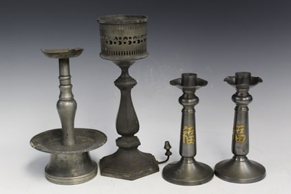 Four Pewter Candle Holders