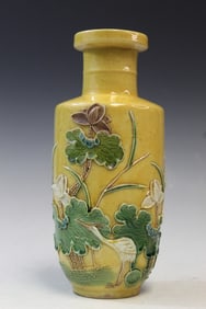 Chinese Sancai Porcelain Vase With Bird and Lotus Flower Relief Decorations.