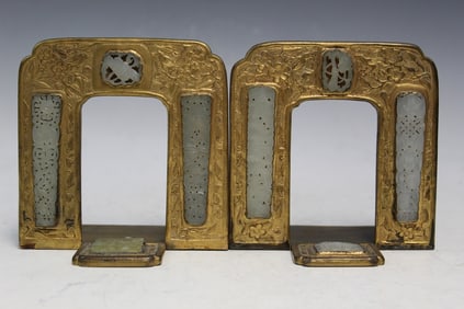 Pair of gilt brass bookends with Chinese white jade inlaid