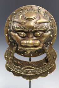 A Large Chinese Brass Lion Door Knocker