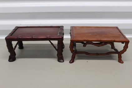 Two carved wood stands