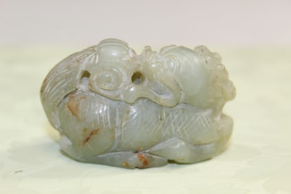 Chinese Carved Celadon Jade Qilin Toggle.