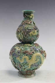 Chinese Sancai Double Gourd Porcelain Vase with Relief Dragon Decorations.