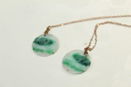 Two Chinese Jadeite Pendant Necklaces
