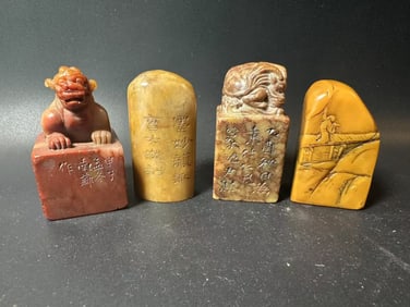 Four Chinese carved soapstone seals.