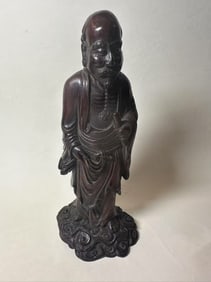 Chinese carved Chengxiang wood statue of a Buddha.