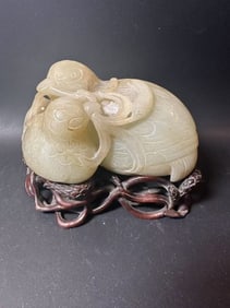 Chinese carved white jade figure.