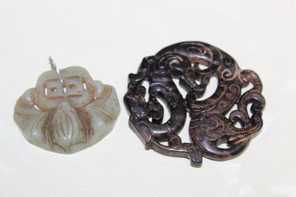 Two Chinese Carved Jade Pendants