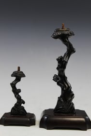 Two Chinese carved Zitan wood candle sticks in Lingzhi shape.