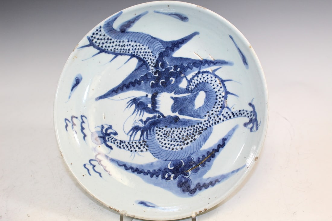 Chinese Blue and White Porcelain Dish with Dragon Decoration: Chinese Blue and White Porcelain Dish with Dragon Decoration. Diam 27 cm.