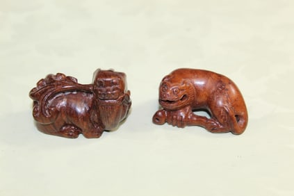 Two Asian Carved Wood Toggles