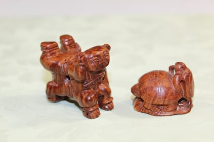 Two Asian Carved Wood Toggles