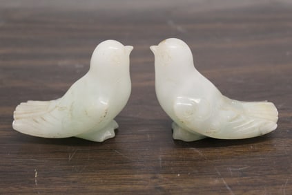 Two Carved Stone Birds.