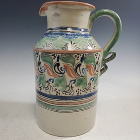 Art pottery jug. Artist signed.