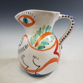 Art pottery jug. Artist signed.