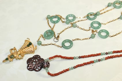 Two Beaded Necklaces and a Gilt Pendant