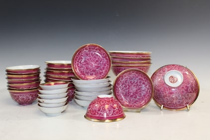 A Group of Chinese Burgundy Glazed Porcelain Dishes and Bowls