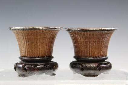 Pair of Chinese Silvertone Woven Bamboo Cups on Wood Stands.
