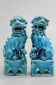 Pair of Chinese Turquoise Glazed Porcelain Foo Dog Statues