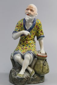 Chinese Famille Rose Porcelain Figure of a Fisherman