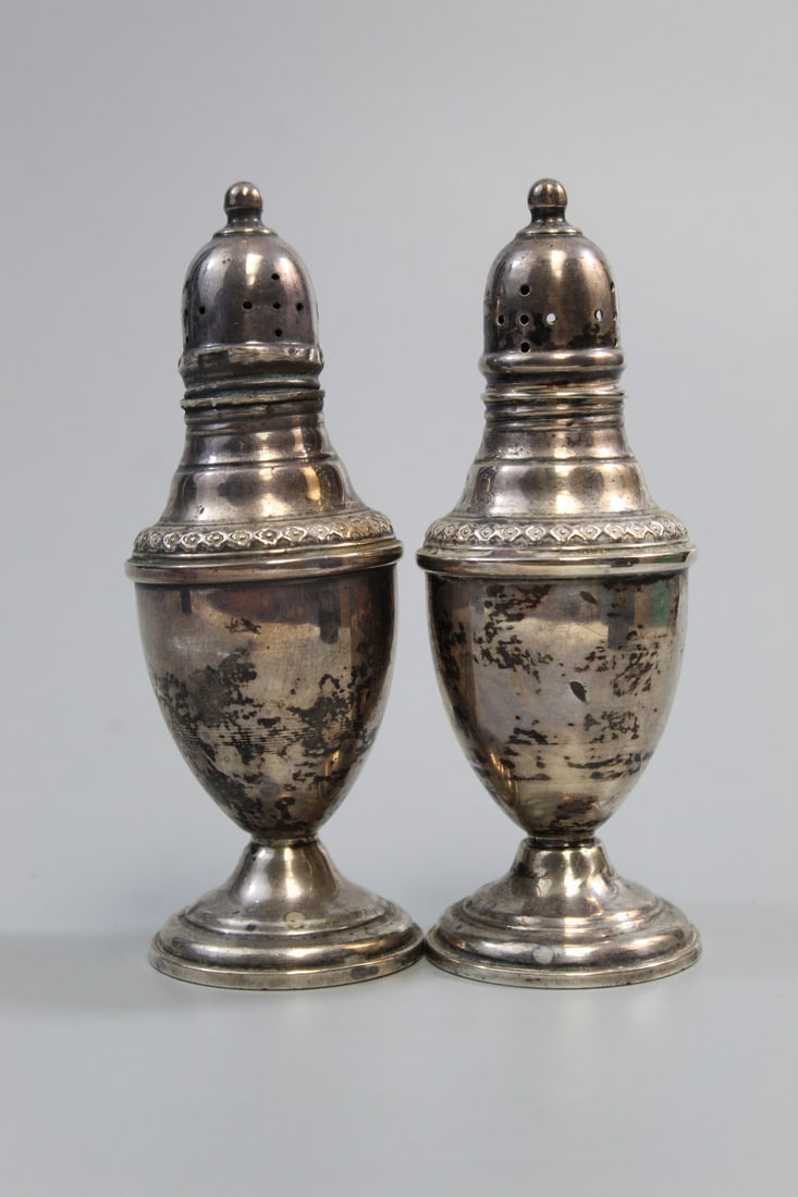 Pair of Rogers Sterling Silver Salt & Peppers: Pair of Rogers Sterling Silver Salt & Peppers. H 4.75". Wt 119 G.