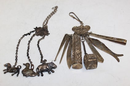 Two Asian Metal Pendants