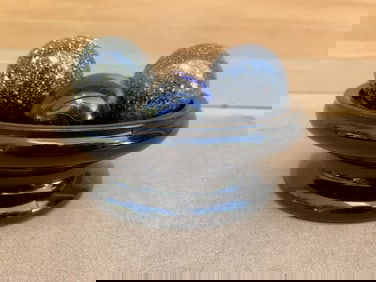 Glass and Stone Marbles in a Bowl