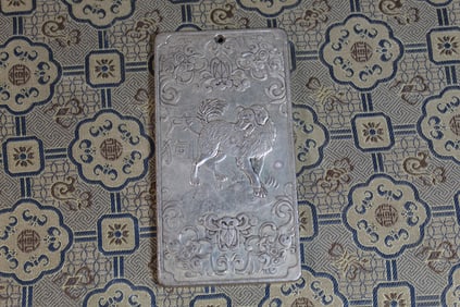 Silver tone amulet