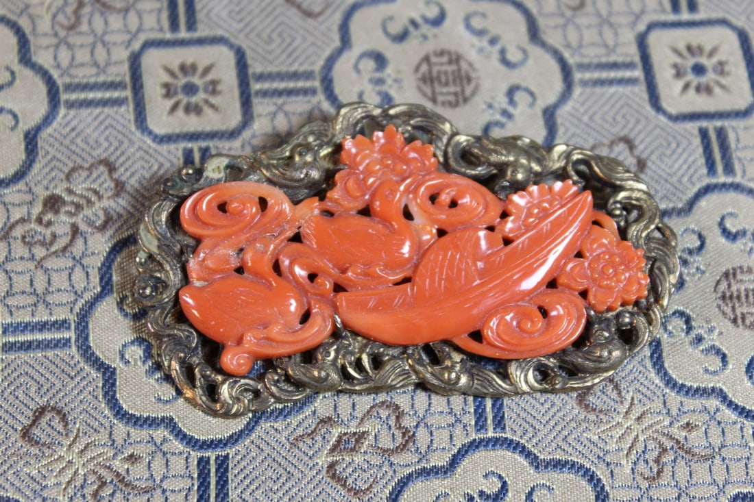 Chinese coral and silver brooch: Chinese coral and silver brooch. Size 2.5 x 1".