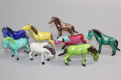Eight Chinese Glazed Porcelain Horse Figurines