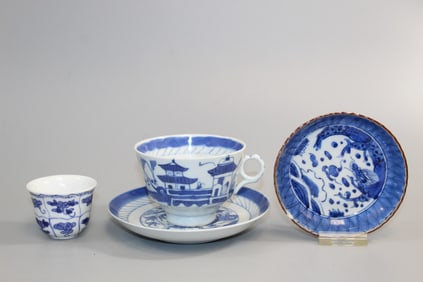 Group of Asian blue and white porcelain cups and dishes
