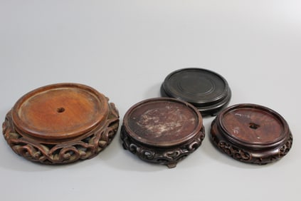 Four wood stands