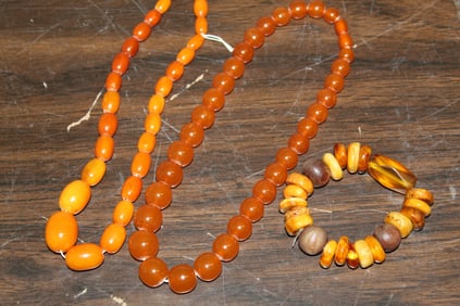 Two amber necklace and one amber bracelet