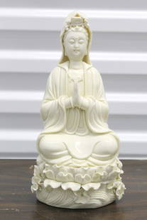Chinese Blanc De chine porcelain Guanyin statue: Chinese Blanc De chine porcelain Guanyin statue. H 10.5"