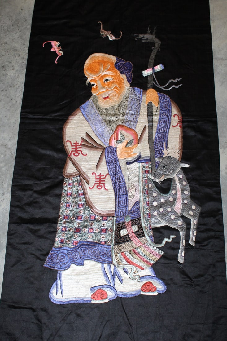 Chinese needle work of Shoulao on silk: Chinese needle work of Shoulao on silk. Size 64 x 27".