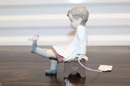 Lladro porcelain figurine of a boy