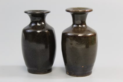 Two Chinese Dark Glazed Pottery Vases