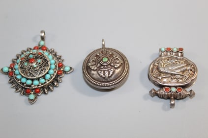 Three Tibetan Silver Pendants