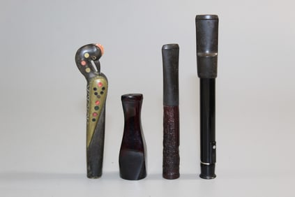 Four Vintage Cigarette Holders