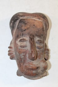 Colima Head of a Man Chewing Tobacco or Similar Substance.
