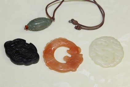 4 Chinese Pendants