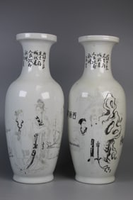 Pair of Chinese Porcelain Vases with Carved Figures