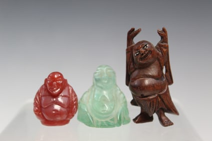 Three Chinese Laughing Buddha Figurines