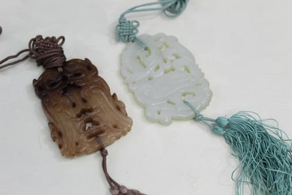 Two Chinese Carved Jade Pendants