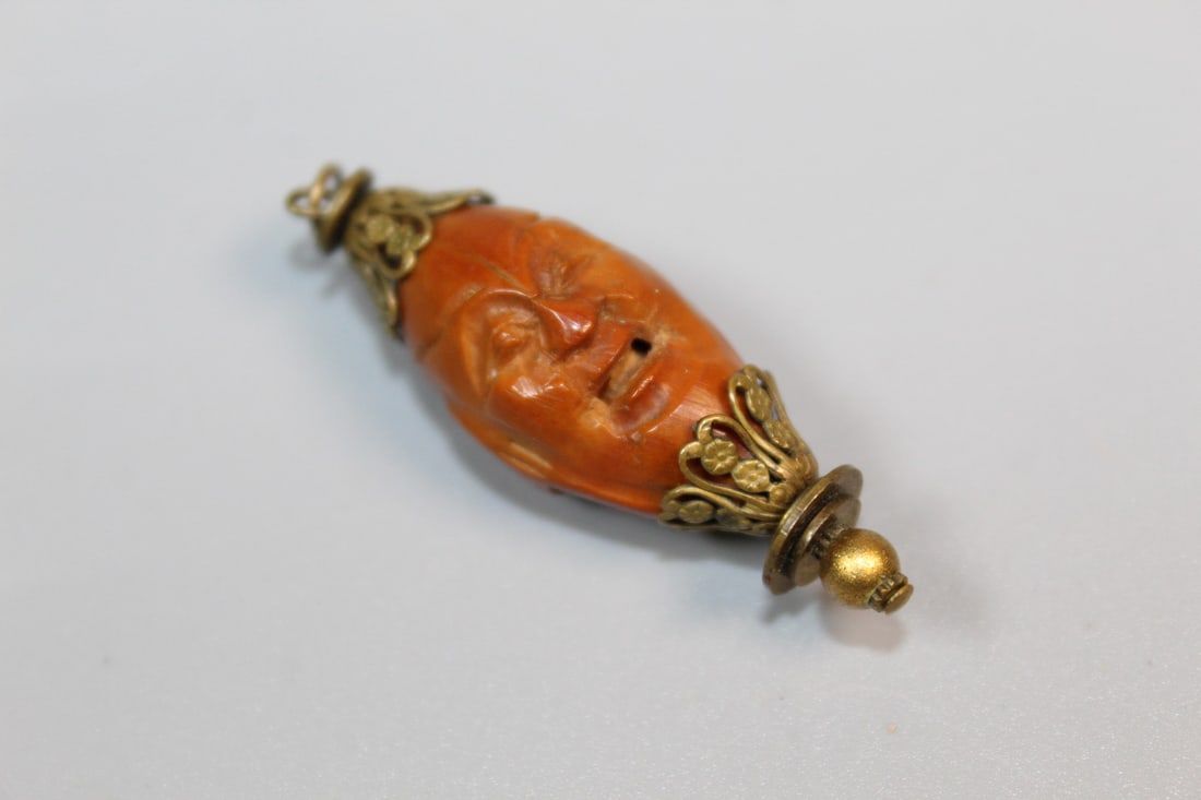 Chinese Carved Olive Nut Pendant: Chinese Carved Olive Nut Pendant. L 1.5".
