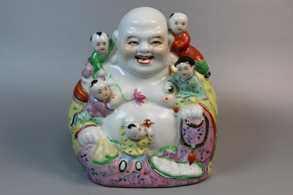 Chinese famille rose porcelain statue of a laughing Buddha