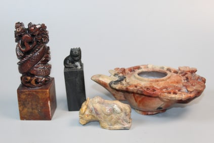 Four soapstone carvings