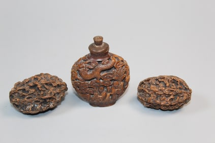 Two walnut carvings and a snuff bottle