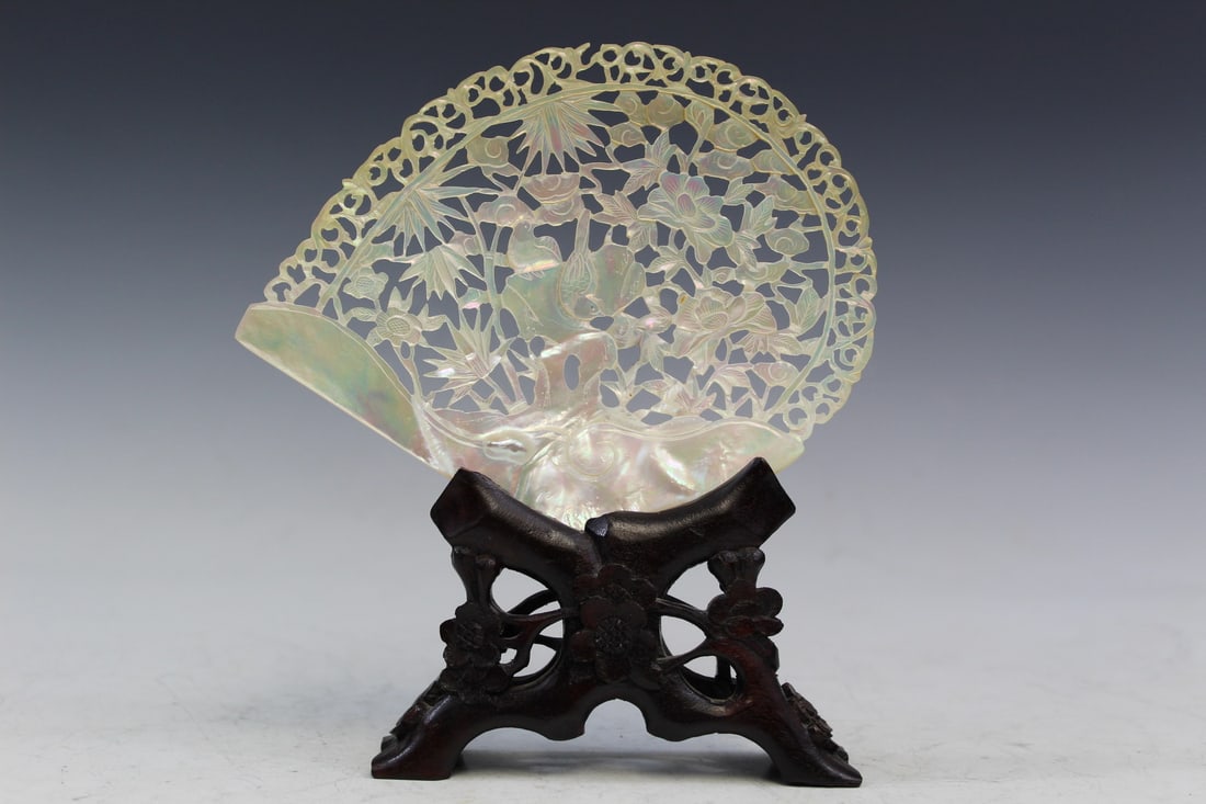 Chinese Carved Sea Shell on Wood Stand.: Chinese Carved Sea Shell on Wood Stand. Shell L 6.25".