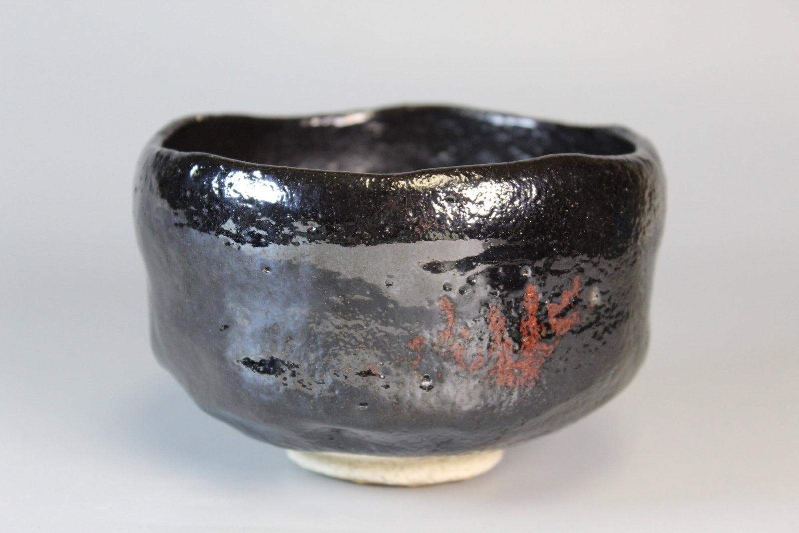 Japanese Black Glazed Tea Bowl: Japanese Black Glazed Tea Bowl. Diam 4.75". H 3".